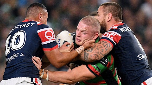 Stranglehold: Sio Siua Taukeiaho (left) and Jared Waerea-Hargreaves collar George Burgess.