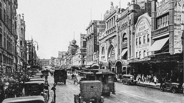 Cole's arcade on Bourke Street between Elizabeth and Swanston streets, looking east towards Parliament House.