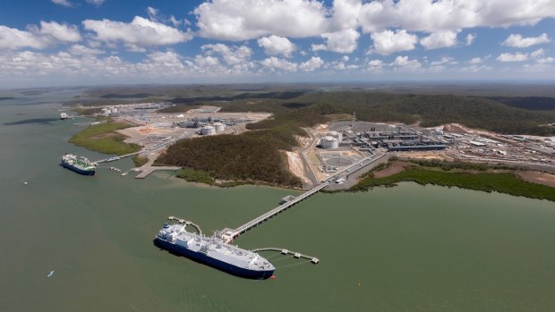An aerial view of three LNG projects on Curtis Island all with ships at their jetties, with Australia Pacific LNG in the background (file image). 