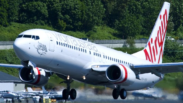 A file photo of a Virgin Australia Boeing 737. One of these aircraft made a dangerous landing at Christchurch Airport in 2015 due to the company's policy to treat damp runways as dry ones. 