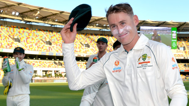 Labuschagne acknowledges the fans after the end of the day's play at the Gabba.