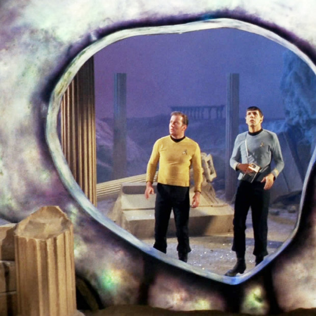 Star Trek stars William Shatner as Captain James T. Kirk and Leonard Nimoy as Mr Spock stand before a time and space portal known as the Guardian of Forever.