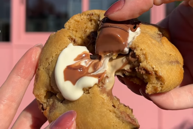 A Brooki cookie being opened up in front of a store