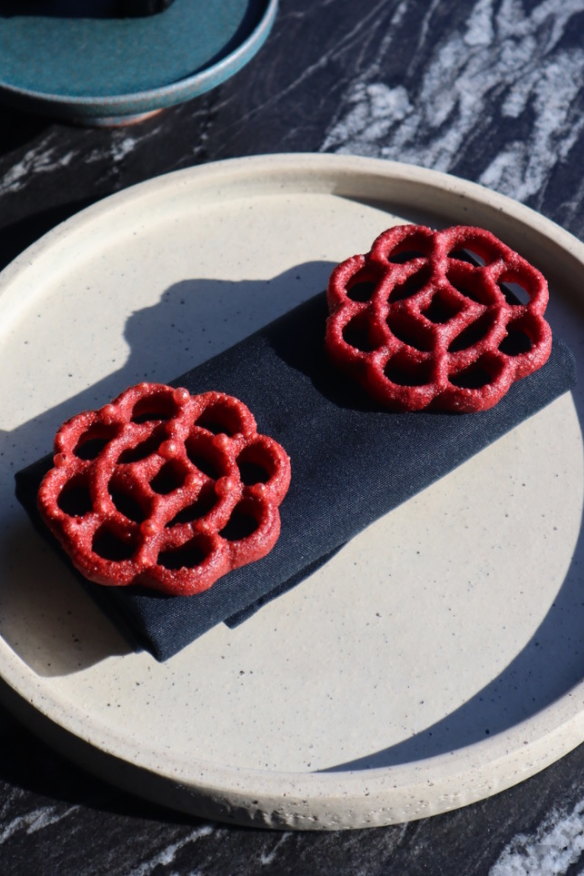 Beetroot rosette filled with oyster braudade and lime.