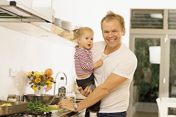 Bill Granger in the kitchen with his daughter Edie in 2002.