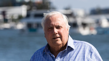 The Electoral Commission of Queensland has asked the Supreme Court to decide whether businessman Clive Palmer is a property developer and therefore banned from making political donations.