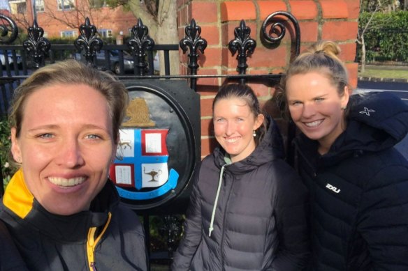 Lauren Breadmore, Storm Hunter and Belinda Woodcock at the Wesley College gates. 