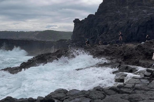 The same spot where the group of four were washed away, according to an eyewitness.