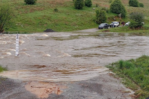 A four-wheel drive ute was washed off the road due to floodwater on the Gounyan road, Murrunbateman. 