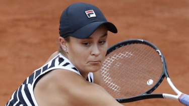 Ash Barty in action against her opponent from the previous round, Danielle Collins.