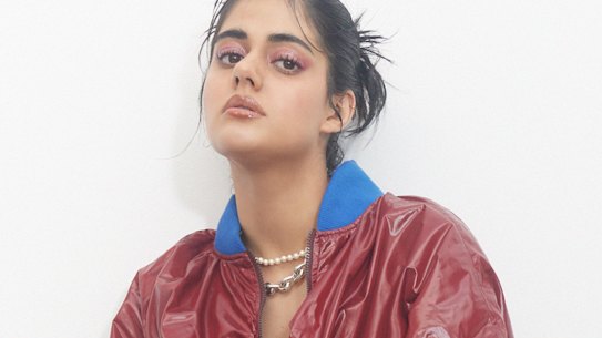 Perple “Armada” jacket, $525. Chopova Lowena “Isola” skirt, $2765, from Parlour X. Vivienne Westwood “Simonetta” pearl necklace, $445, from Parlour X. Dinosaur Designs “Hug” silver choker, $975. Max Mara boots, $1870 (worn throughout).