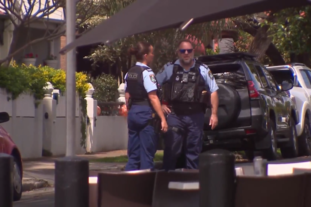 A large police presence remains on scene. 