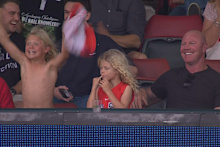 Barry Hall and his kids celebrate a goal.