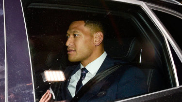 In the balance: Israel Folau leaves a Rugby Australia code of conduct hearing in Sydney on Sunday. He will front up for a third day today after the weekend’s stalemate.
