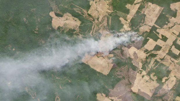 This August 20 satellite image courtesy of Planet Labs shows smoke billowing from fires in Mato Grosso, Brazil.