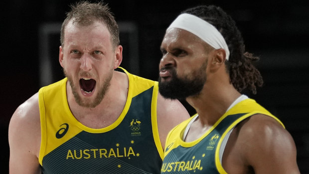 Roar emotion: Joe Ingles and Patty Mills are pumped up as success against Slovenia looms.
