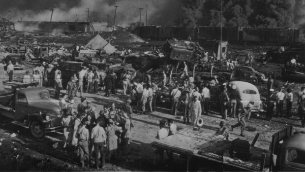 "This is a view of the dock area after a series of damaging explosions which caused huge loss of life. April 17, 1947."