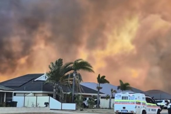 The blaze is burning close to homes.