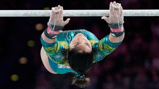 Georgia Godwin of Australia performs on the uneven bars during the women’s all-around finals.