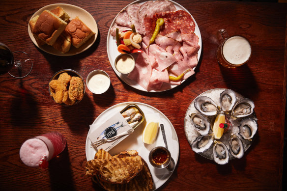 Tins of sardines, oyster shooters with Clamato dashi and “cold cuts” are among the snacks.