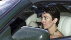 British socialite Ghislaine Maxwell, driven by Prince Andrew, leaves the wedding of a former girlfriend of the prince in September 2000.