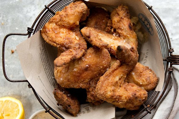 Buttermilk fried chicken with hot sauce.