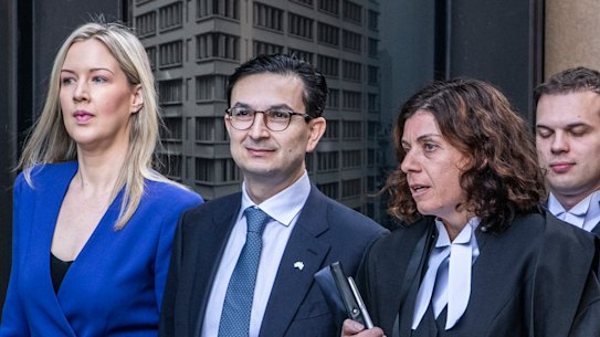 Munjed Al Muderis with his partner Claudia Roberts, left, and barrister Sue Chrysanthou, SC, outside the Federal Court in Sydney on September 4.