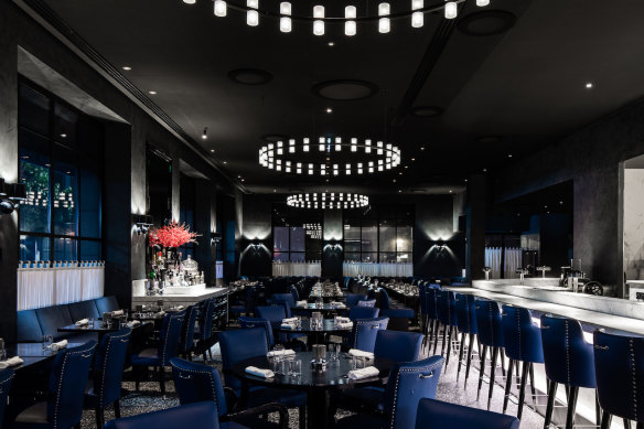 Grill Americano’s midnight blue dining room.