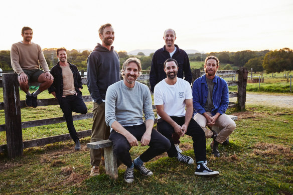 Co-owner Darren Robertson (seated, in grey top) with the rest of the Three Blue Ducks team.