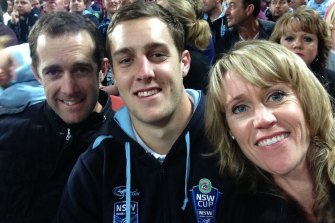 Old soul ... Isaah Yeo with his parents Justin and Amy back in 2014.