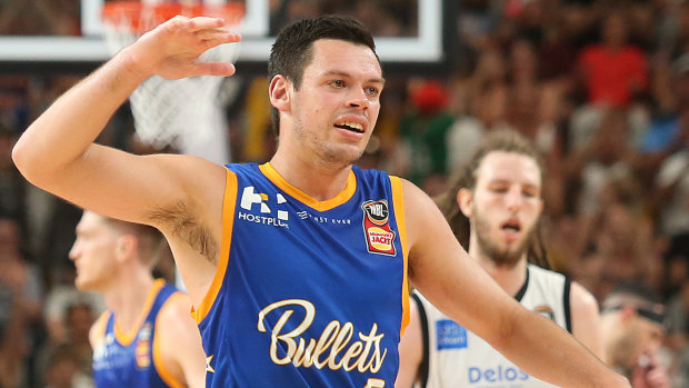 Firing up: Brisbane's Jason Cadee celebrates hitting a clutch three-pointer to extend Brisbane's lead over Melbourne United during their round 12 clash at the Gold Coast Sport and Leisure Centre.