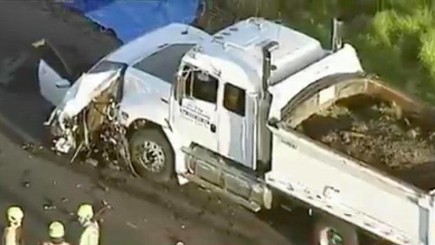A damaged truck at the scene of the crash. 
