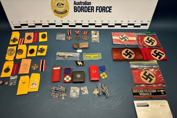 Nazi iconography was among the items seized from two Perth homes.