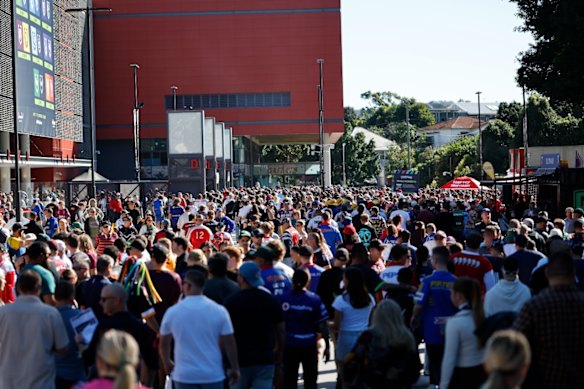 Fans crowd Suncorp Stadium for Magic Round.