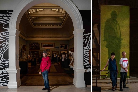 Artist Badger Bates (left) and Heather Ackroyd and Dan Harvey (right) with one of their monumental prints-on-grass at the Art Gallery of NSW.