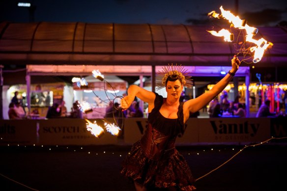 A fire twirler at Brisbane’s West End Solstice Market.
