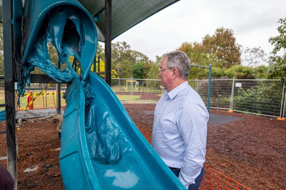 Moreton Bay Mayor Peter Flannery inspects arson damage at Ebert Park.