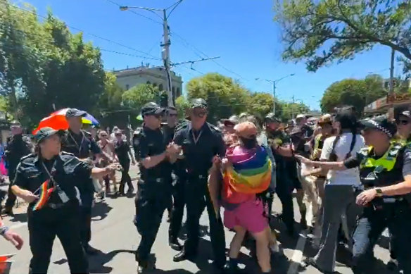 Protesters confront police on Sunday.