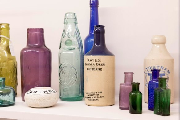 Some of Barry Walker’s Queensland-made historic bottles in the Precious exhibition.
