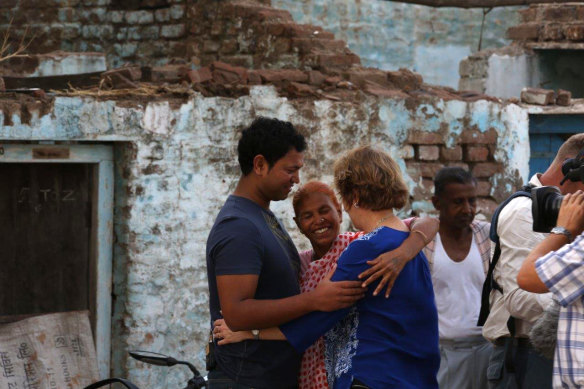 Saroo with his birth mother, Fatima, and Sue in Khandwa, India. Saroo and Fatima were reunited after being separated for 25 years. 