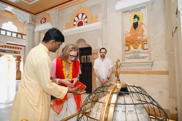 Premier Jacinta Allan and parliamentary secretary Nick Staikos are shown through the Laxmi Narayan Mandir temple in Delhi.