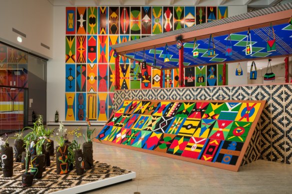 Installation of Haus Yuriyal’s artwork including (front to back) Bopa, 2024, Kalabus, 2024, Kamkau Ike (Haus Toktok) 2024, with Yuriyal Bridgeman’s Yuri Alai Eagles (ceiling shield paintings) 2024 and Kuman (shield) paintings, 2024. 