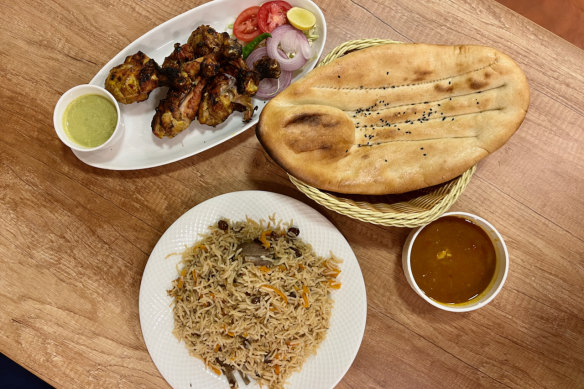 Abuli pulao, the Afghan national dish, is a fragrant combination of rice, tender lamb, raisins, carrot and chopped almonds.