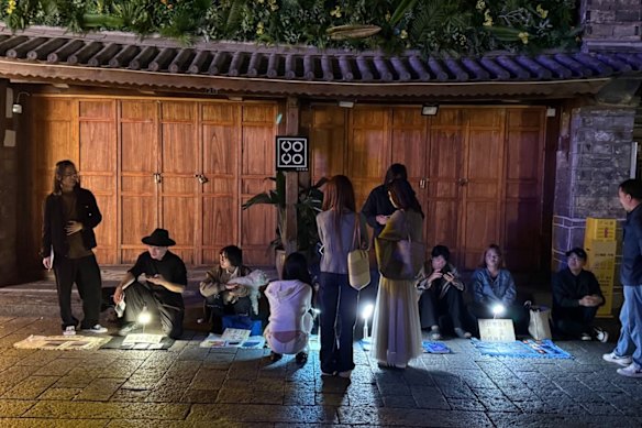 Young creatives sell their poetry and handicrafts at pop-up stalls after midnight in Dali’s old town.