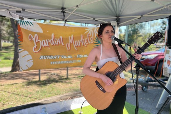 A performer at the Bardon Markets.