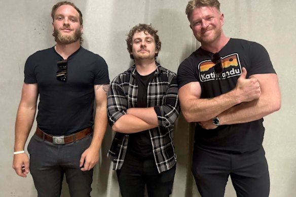 Laurence McIntyre (middle) pictured months before his campaign stunts with neo-Nazis Joel Davis and Blair Cottrell at a white supremacist gathering.