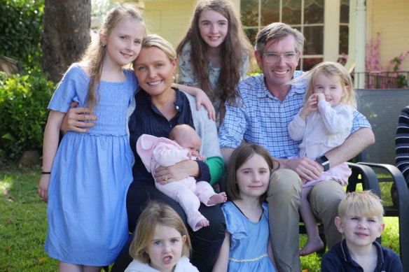 Helen and Dominic Perrottet with their family, including the latest addition, baby Celeste.