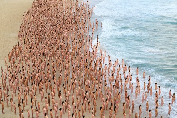 Sydneysiders stripped nude to take part in a Spencer Tunick shoot at Bondi Beach last year.