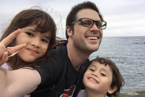 Freelance journalist Scott McIntyre with his two children in Japan.