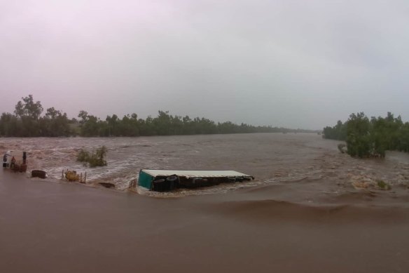 A truck driver was lucky to survive after his truck became trapped in floodwaters. 